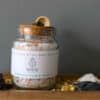 Throat Chakra Ritual Bath Salts for Communication & Truth | Glass jar of bath salts on shelf with blue crystal | Shine Body & Bath
