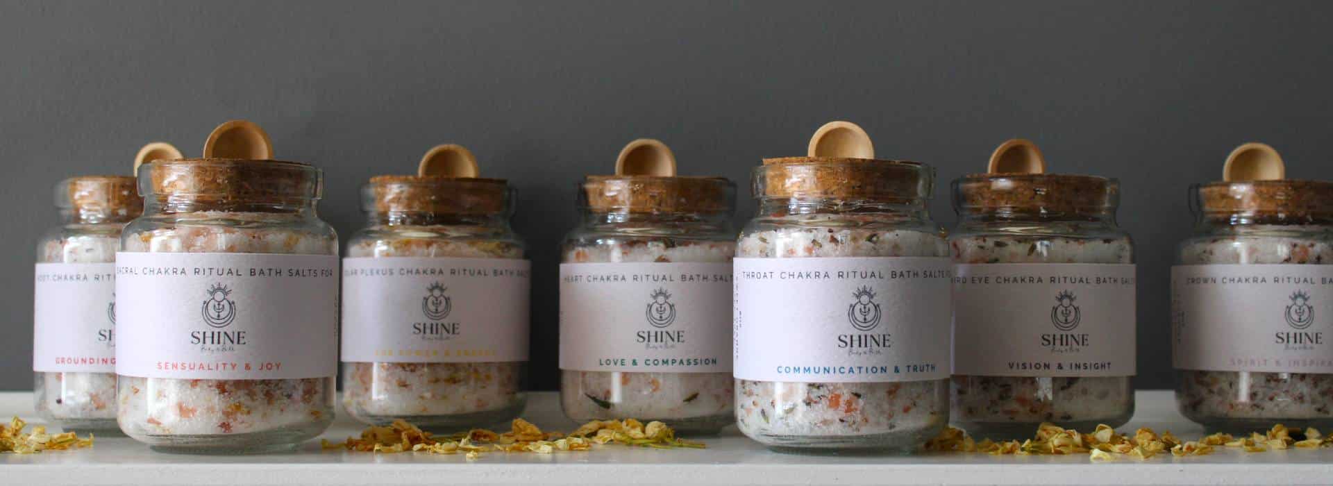 Selection of Chakra Ritual Bath Salts on a shelf | 9 Different Ways to Use Shine Body & Bath Products | Blog