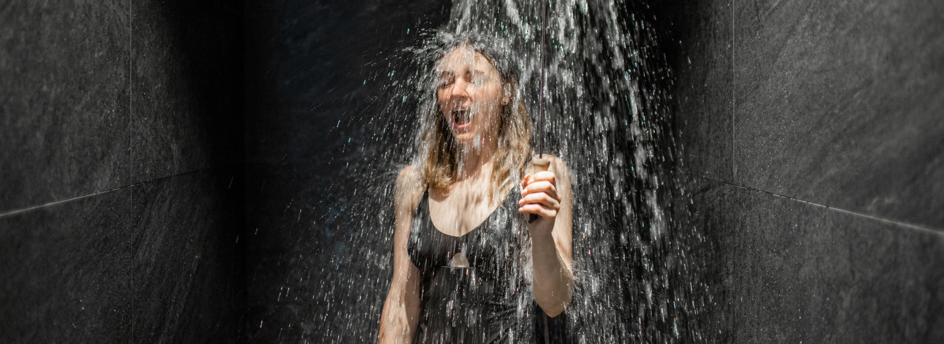 Woman under shower | How to live more joyfully | Shine Body & Bath Chakra Soap | Blog